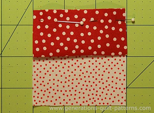 Pin the folded knot square to a background square