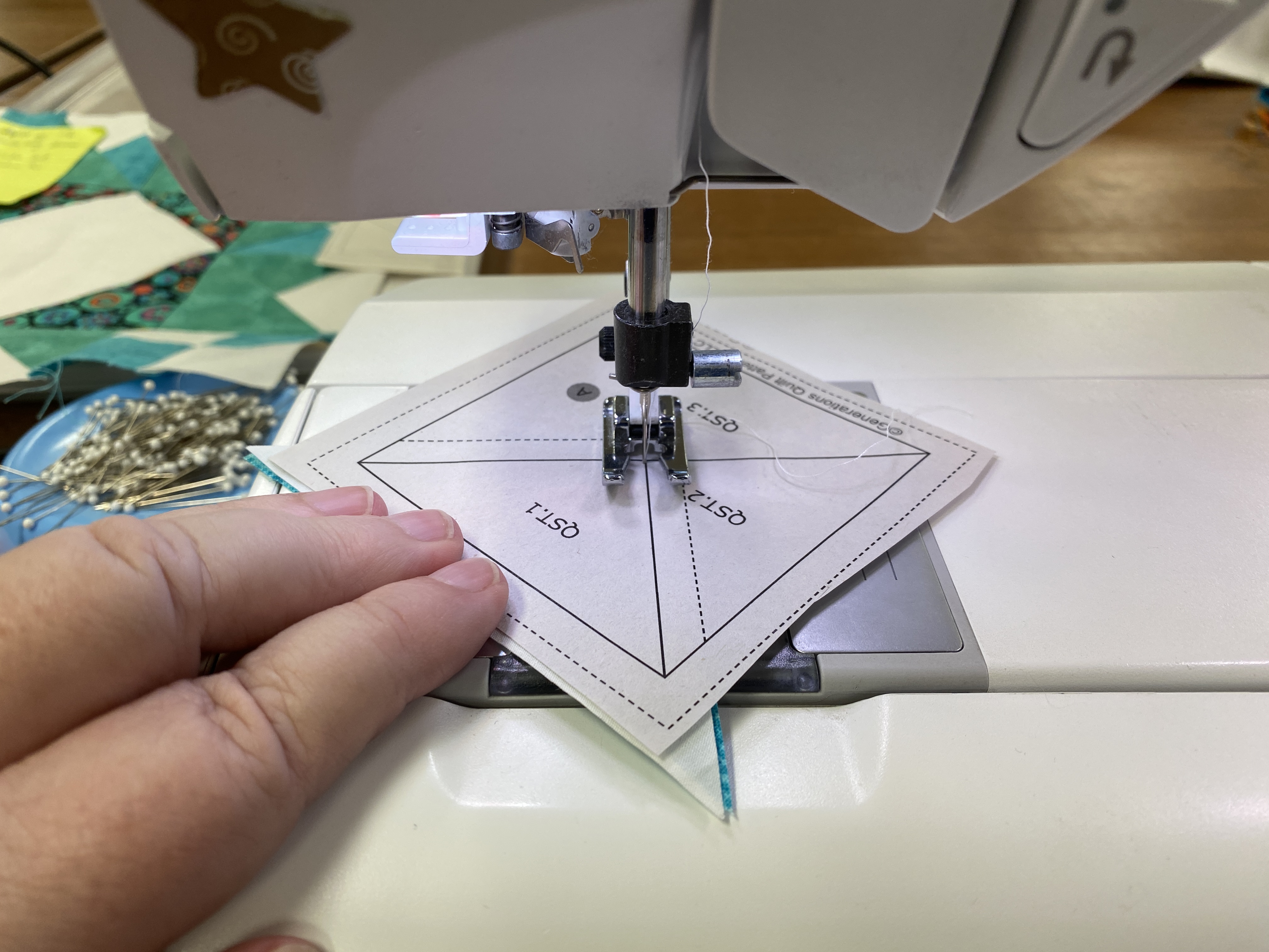 Sew on the line between QST.1 and QST.2 Sew on the line between QST.1 and QST.2