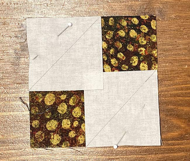 Pin one #5 to a pair of diagonal corners, matching the edges Pin one #5 to a pair of diagonal corners, matching the edges