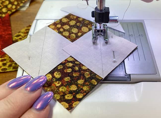 Sew each #5 on the side of the marked line closest to the corner