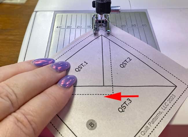 Stitch the seam to join QST.1 and QST.2