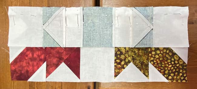 Pin the rows together to hold the edges even and the SAs in position Pin the rows together to hold the edges even and the SAs in position