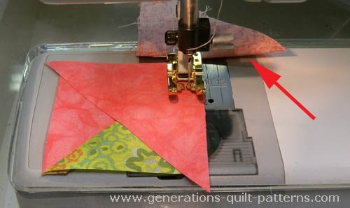 Stitch #3 to the HST unit, the arrow points to my anchor cloth Stitch #3 to the HST unit, the arrow points to my anchor cloth