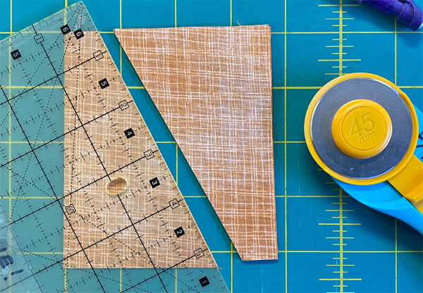 After marking 5/8" in from the left top and bottom right edge, cut in half diagonally