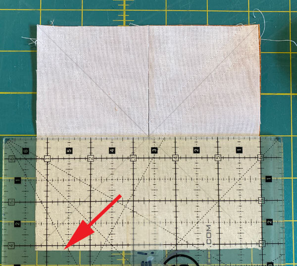 Cut the squares in half through the horizontal center.