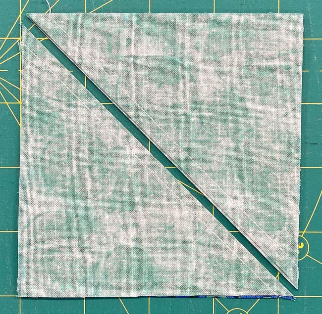 Cut the stitched #1/#2 in half along the drawn line Cut the stitched #1/#2 in half along the drawn line