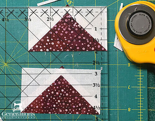 Using a Wing Clipper ruler to cut away the excess fabric Using a Wing Clipper ruler to cut away the excess fabric