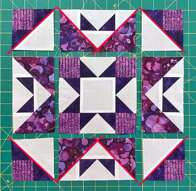 Arrange the units into the Castle Garden quilt block design Arrange the units into the Castle Garden quilt block design