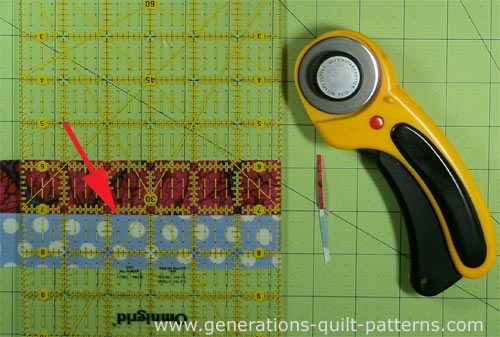 Straighten one short side of the strip set