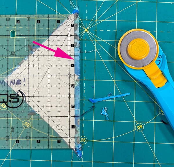 Trim away the excess to leave a 1/4" seam Trim away the excess to leave a 1/4" seam