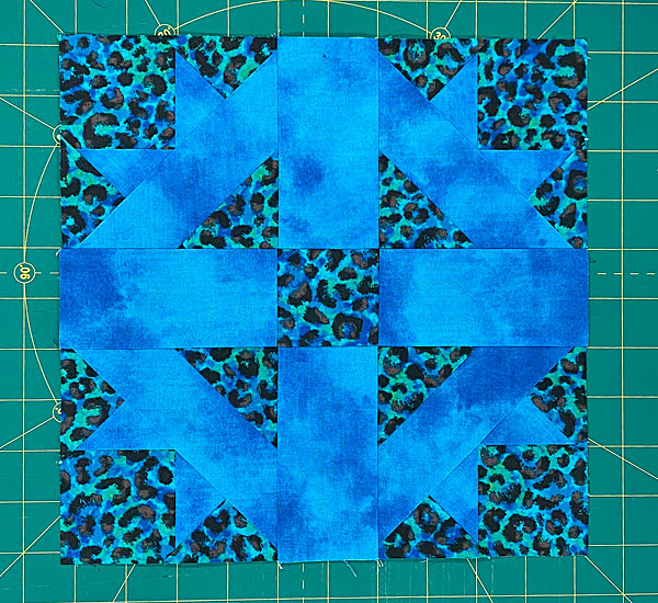 The finished Cross and Crown quilt block, front side The finished Cross and Crown quilt block, front side