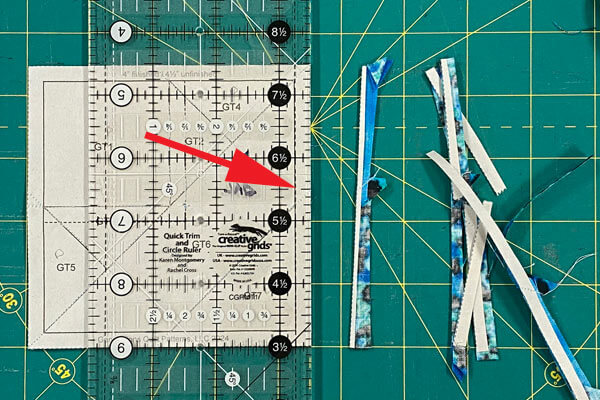 Trim the outside edges down to 1/4" on each side Trim the outside edges down to 1/4" on each side