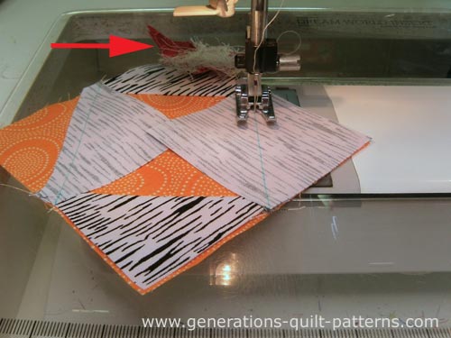 Stitch the final connector corner to the center square