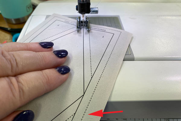Your stitching started outside the dashed line and ends outside the dashed line Your stitching started outside the dashed line and ends outside the dashed line