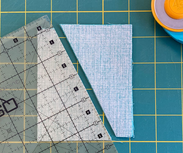 Cut the patches in half using the markings as guides Cut the patches in half using the markings as guides