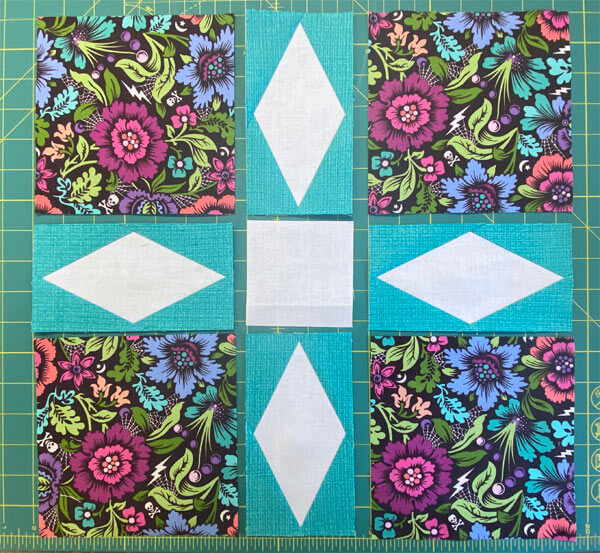 Layout the pieced DR and cut squares into the Darting Minnows design Layout the pieced DR and cut squares into the Darting Minnows design