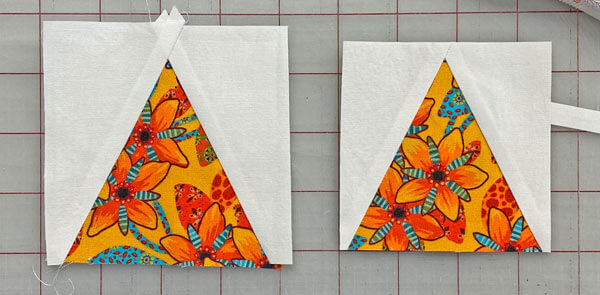 Untrimmed versus a trimmed Triangle in a Square unit Untrimmed versus a trimmed Triangle in a Square unit