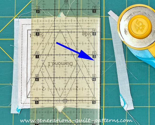 Position the 1/4" mark on the ruler on one side of the solid square that surrounds the unit Position the 1/4" mark on the ruler on one side of the solid square that surrounds the unit