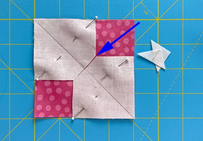 With scissors, cut away the overlap of the small Sky squares.