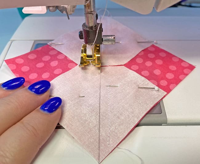 Stitch 1/4" away from both sides of the drawn line