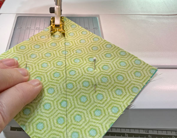 Sew 1/4" away from both sides of each line Sew 1/4" away from both sides of each line