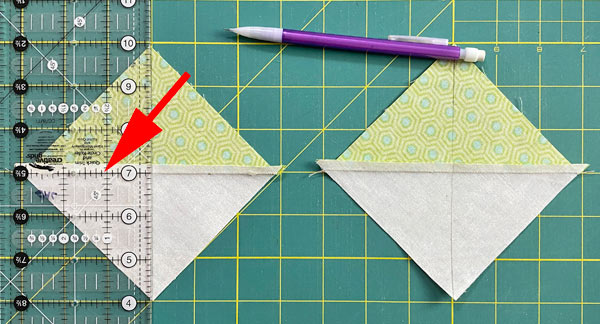 Draw a line from corner to corner on the backside of 2 of the HSTs Draw a line from corner to corner on the backside of 2 of the HSTs