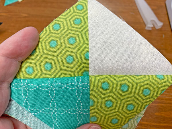 Check for a good match at the center of your QST before cutting the sewn unit in half Check for a good match at the center of your QST before cutting the sewn unit in half