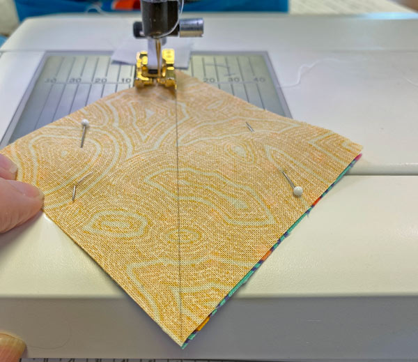 Stitch 1/4" from both sides of the line Stitch 1/4" from both sides of the line