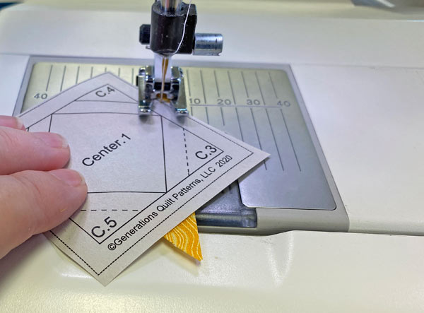 Stitch from one side of the pattern to the other on the line between Center.1 and C.2 Stitch from one side of the pattern to the other on the line between Center.1 and C.2