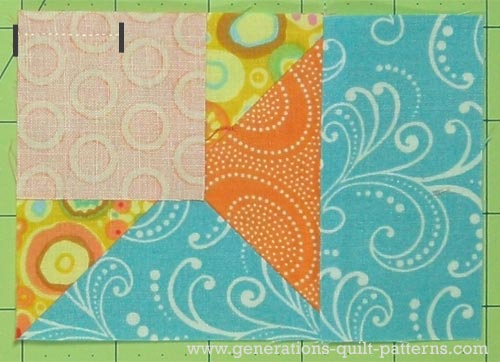 Sew a partial seam to attach the center square