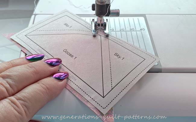 Sewing the seam between Goose.1 and the first Sky.1 Sewing the seam between Goose.1 and the first Sky.1
