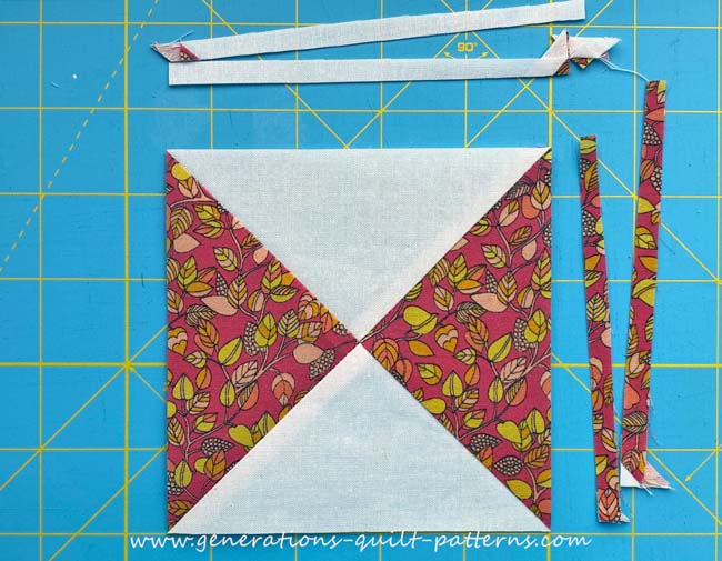 The trimmed, very accurate Quarter Square Triangle unit The trimmed, very accurate Quarter Square Triangle unit