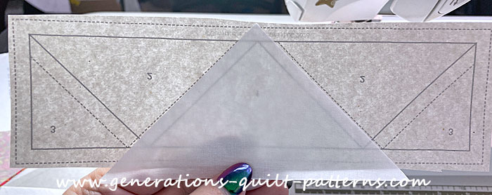 #1 is glued into position on the unprinted side of the pattern
