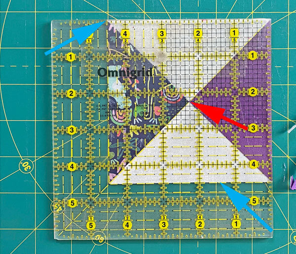Carefully position your ruler before trimming the third and fourth sides