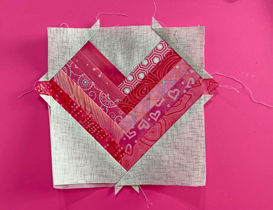 After all the stitchin's done, the block looks like a hot mess...never fear. After all the stitchin's done, the block looks like a hot mess...never fear.