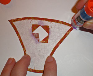 Apply glue stick to the back side of the flag Apply glue stick to the back side of the flag