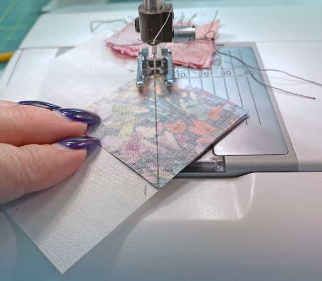 Stitch on the side of the line closest to the corner Stitch on the side of the line closest to the corner