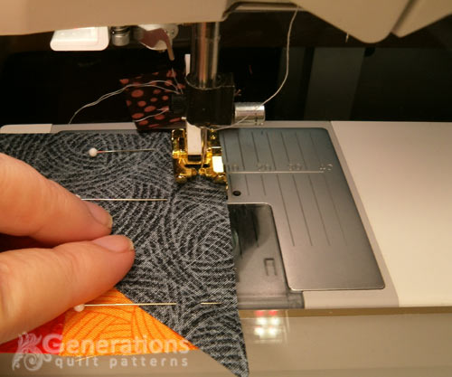 Stitch a #2 triangle to the side of a four-patch unit