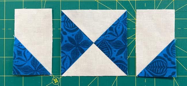 Position a folded corner rectangle on each side of a QST Position a folded corner rectangle on each side of a QST