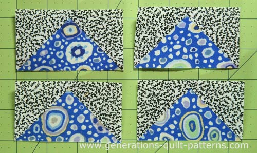 Four finished Flying Geese units, trimmed, pressed and ready for a block