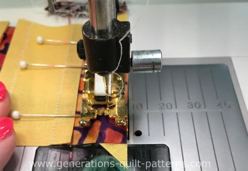 Stitching a #3 to the #1 side of a Rail Fence unit Stitching a #3 to the #1 side of a Rail Fence unit