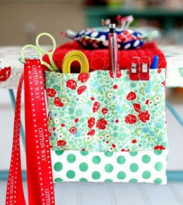 Make an ironing board organizer to keep your tools close at hand Make an ironing board organizer to keep your tools close at hand