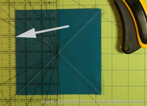 Align the 2-5/8 inch mark of the ruler along the edge of the square