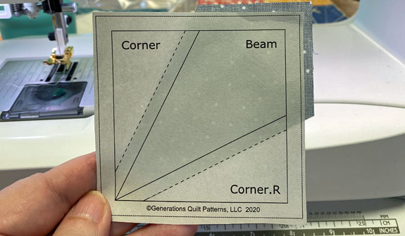 Use a dab of glue to stick the fabric patch to the unprinted side of the Corner Beam pattern Use a dab of glue to stick the fabric patch to the unprinted side of the Corner Beam pattern