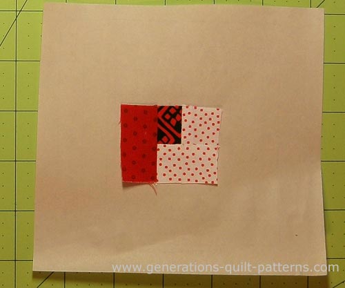 Patches #1-#4 are sewn to the paper pattern