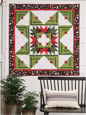 Christmas Star Log Cabin Wall Hanging Pattern by TeriAnn Harms, finishes at 58” x 58”