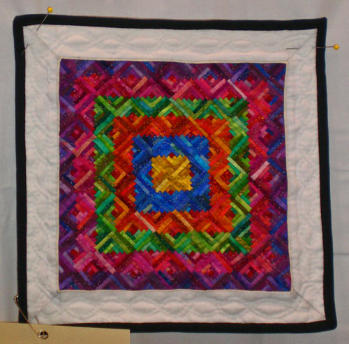 Log cabin quilt squares with tiny logs