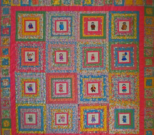 Log cabin quilt squares with a large center square