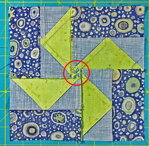 Louisana quilt block from the backside with a twirled or fanned center seam