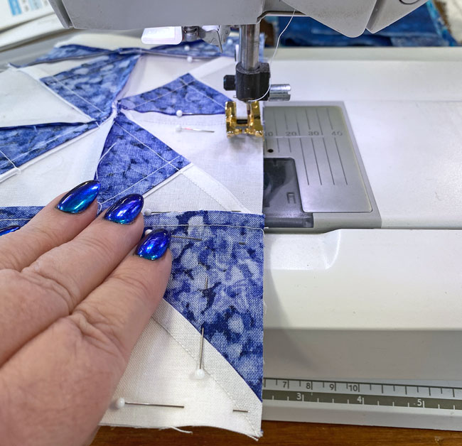 Stitching together 2 pinnes rows Stitching together 2 pinnes rows